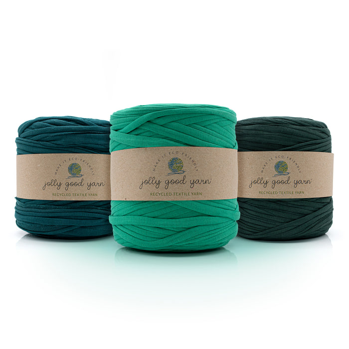Three skeins of dark green T-Shirt yarn with 'jolly good yarn' labels on a white background