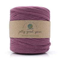 Ball of purple yarn with a 'jolly good yarn' label on a white background