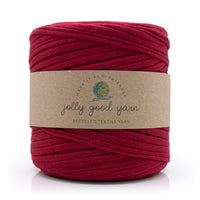 Deep Red skein of yarn with a 'jolly good yarn' label on a white background