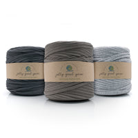 Three balls of T-Shirt yarn in grey shades with 'jolly good yarn' labels on a white background