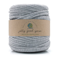 Ball of light grey t-shirt yarn with a 'jolly good yarn' label on a white background