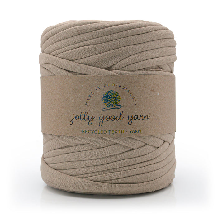 Ball of beige yarn with a 'jolly good yarn' label on a white background