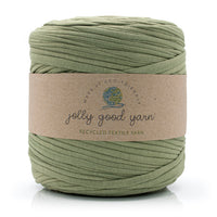 Ball of light green yarn with a 'jolly good yarn' label on a white background