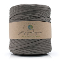 Grey-brown skein of yarn with a 'jolly good yarn' label on a white background