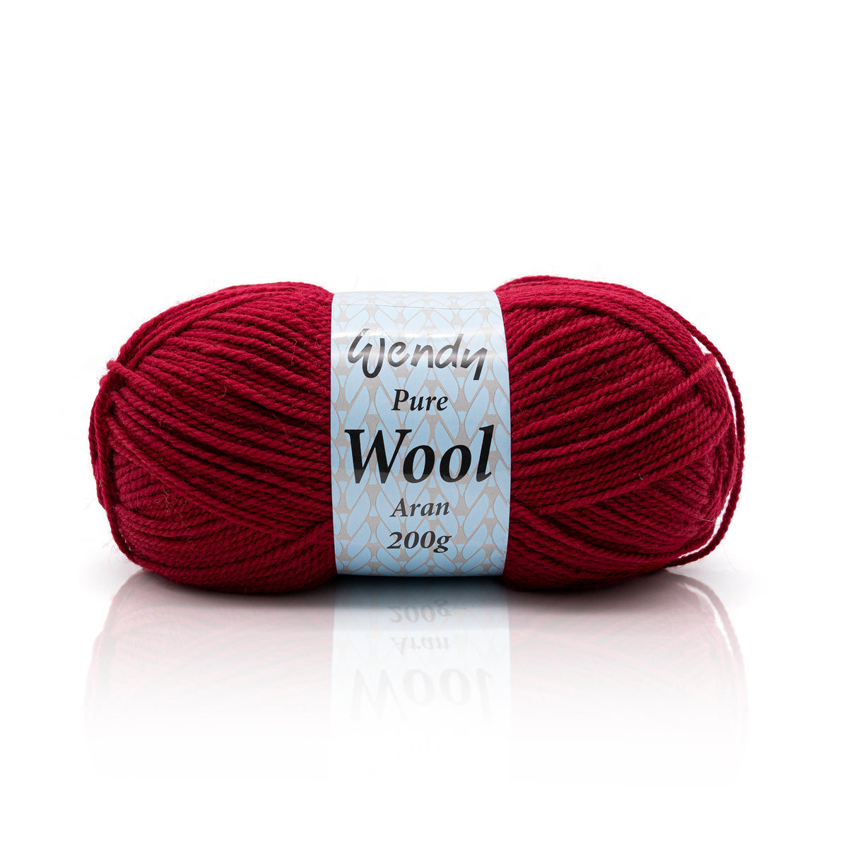 Red ball of yarn with a label on a white background