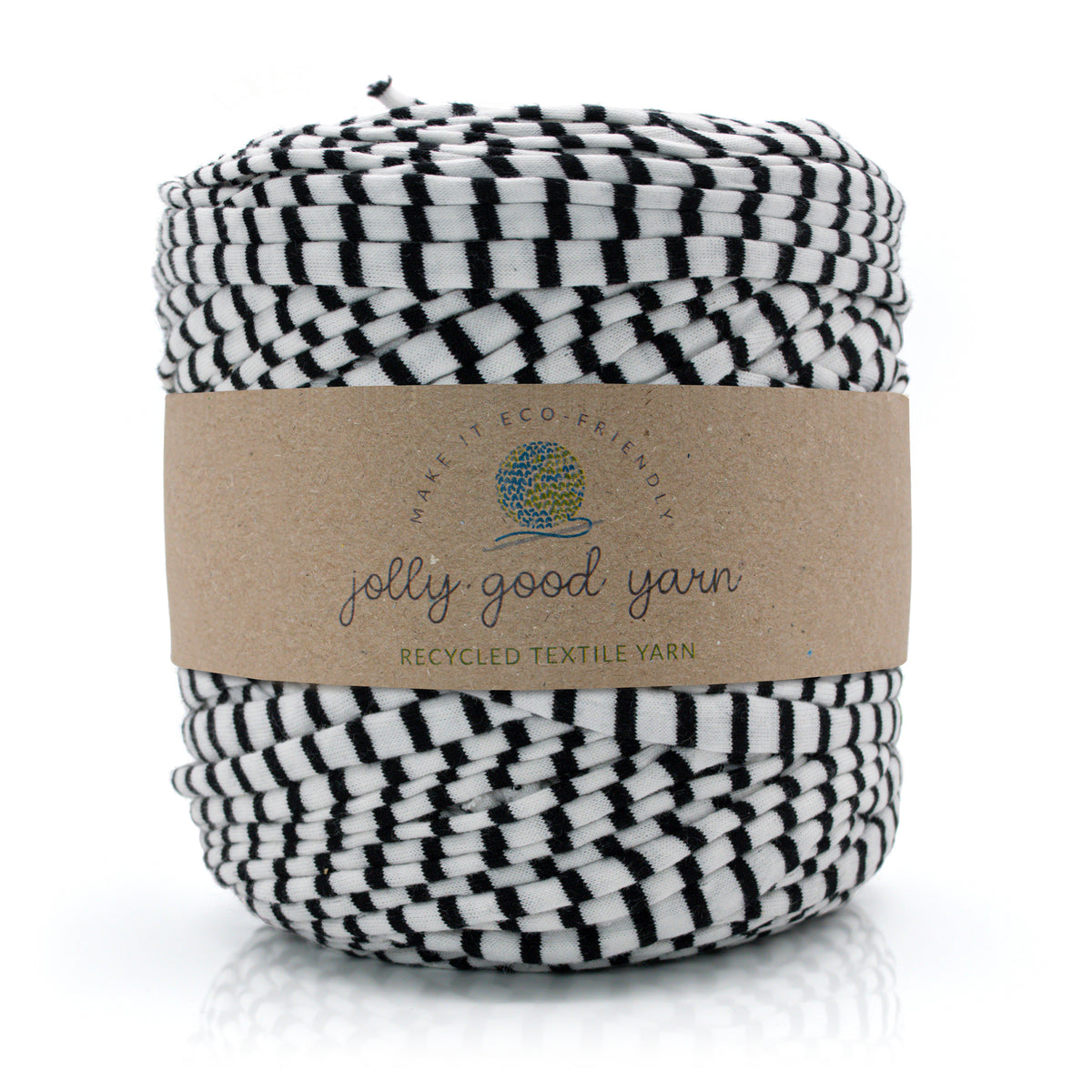 A skein of black and white striped recycled textile yarn wrapped in a brown kraft paper band labeled 'jolly good yarn'.