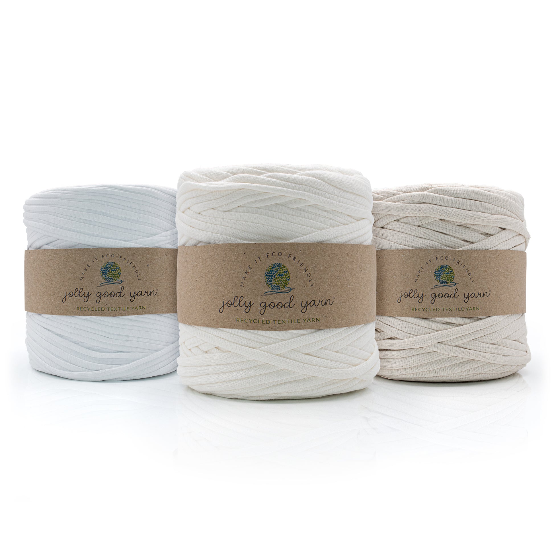 Three balls of different shades of white T-Shirt yarn with 'jolly good yarn' labels on a white background
