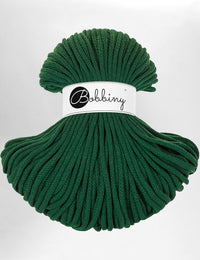 Dark Pine Green 5mm thick macrame cord on a white background.