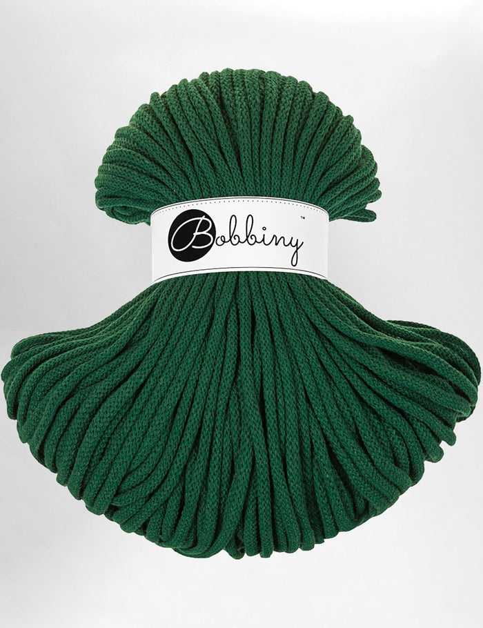 Dark Pine Green 5mm thick macrame cord on a white background.