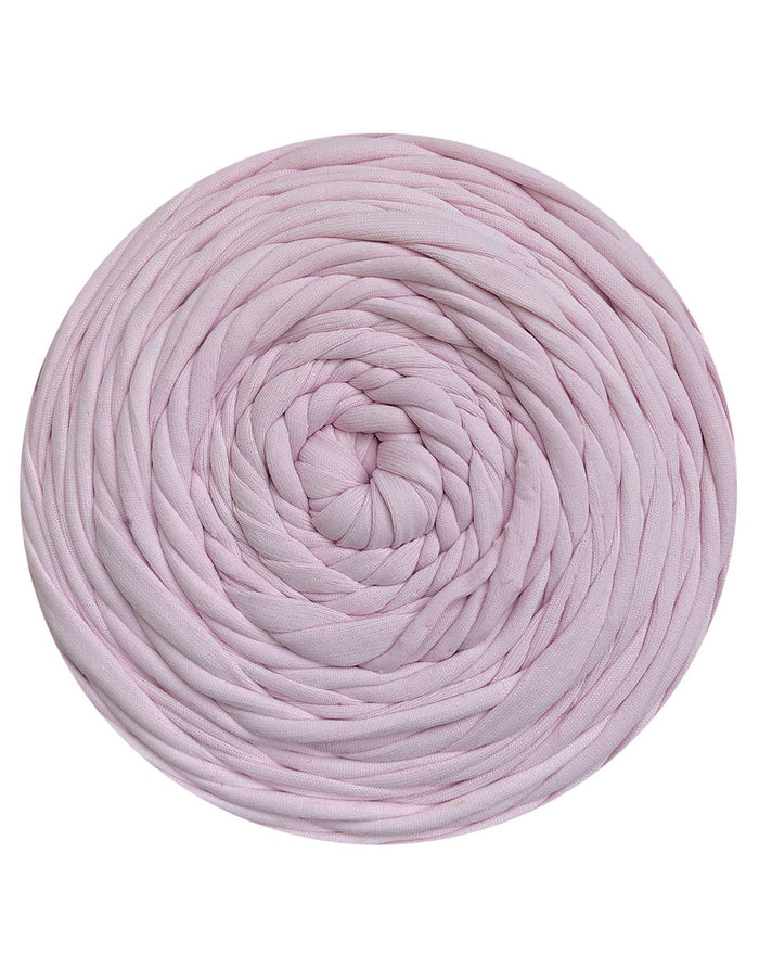 Pink yarn ball on a white background
