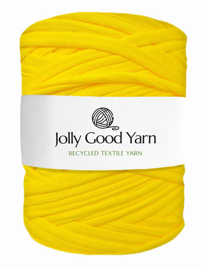 Yellow yarn ball with 'Jolly Good Yarn' label on a white background