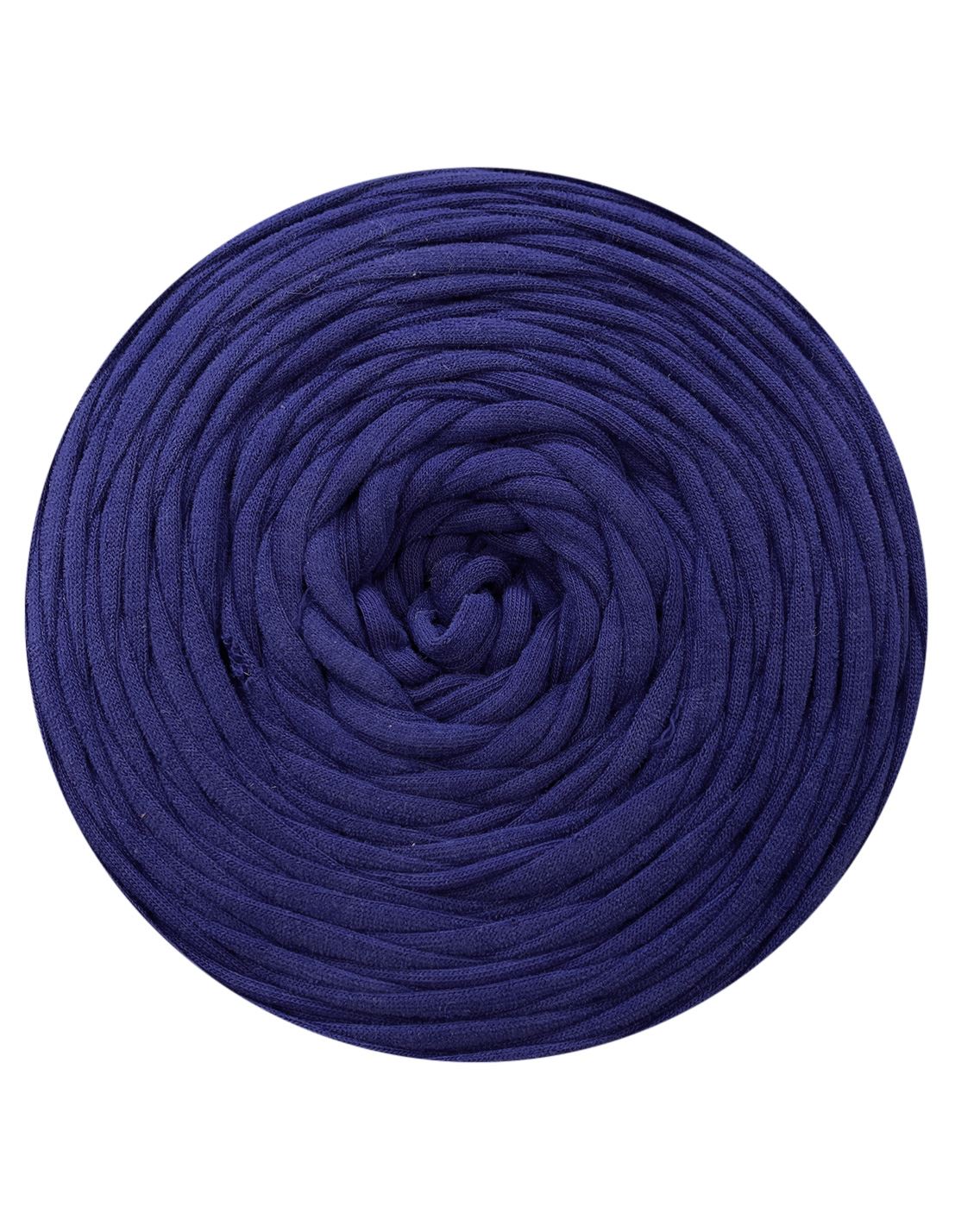 Coiled navy blue yarn on a white background